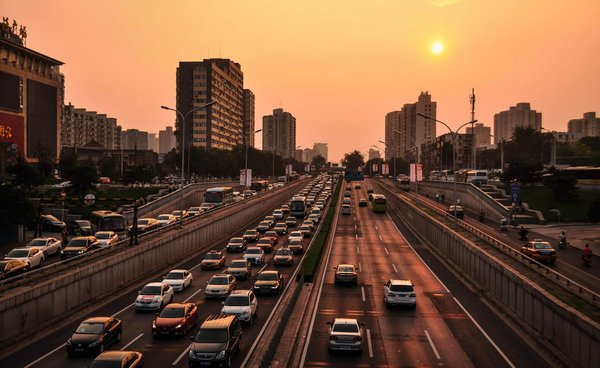 How does eco-friendly transportation impact traffic-related stress and road safety?