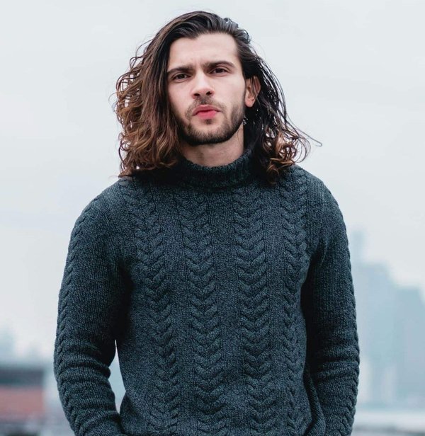 What is the best way to wear a fisherman's sweater stylishly?